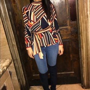 Knee-high navy blue suede boots